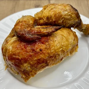 Medio pollo asado al horno